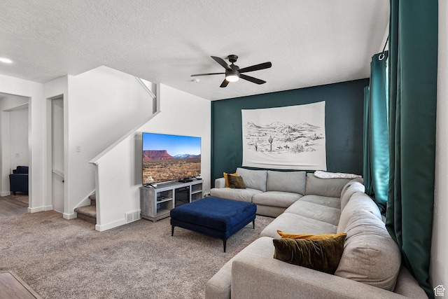 1098 S 4050 W, Syracuse, UT 84075 - carpeted living room featuring a ceiling fan, stairs, and a textured ceiling