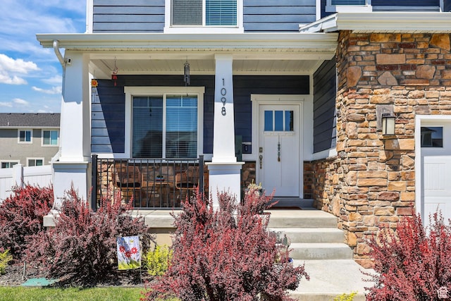 1098 S 4050 W, Syracuse, UT 84075 - property entrance featuring stone siding and covered porch