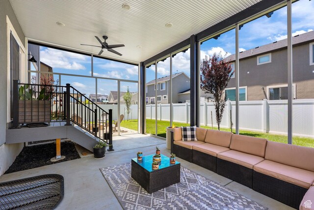 1098 S 4050 W, Syracuse, UT 84075 - sunroom with outdoor lounge area, a ceiling fan, and a residential view