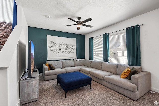 1098 S 4050 W, Syracuse, UT 84075 - living room featuring carpet floors, ceiling fan, plenty of natural light, and a textured ceiling