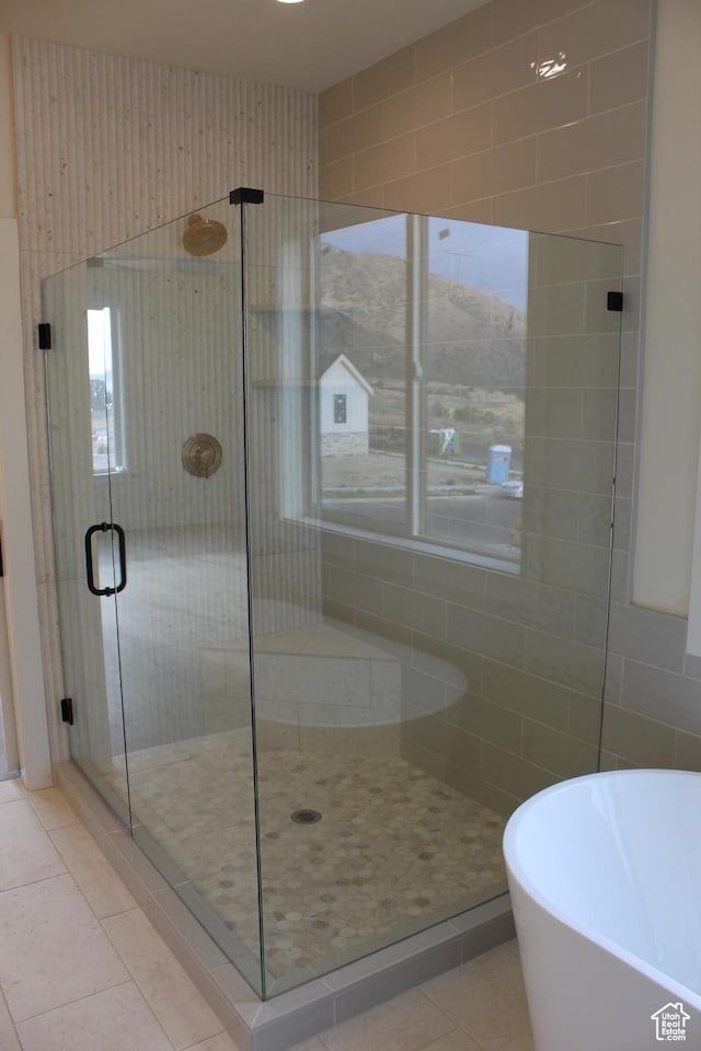 1318 S 1090 E, Salem, UT 84653 - full bath featuring tile patterned floors, a soaking tub, and a shower stall