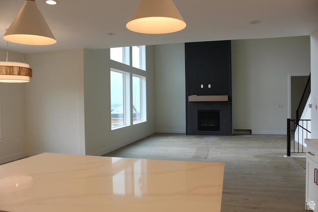 1318 S 1090 E, Salem, UT 84653 - unfurnished living room featuring plenty of natural light, stairs, wood finished floors, and recessed lighting