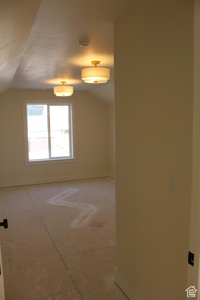 1318 S 1090 E, Salem, UT 84653 - unfurnished room with vaulted ceiling and a smoke detector