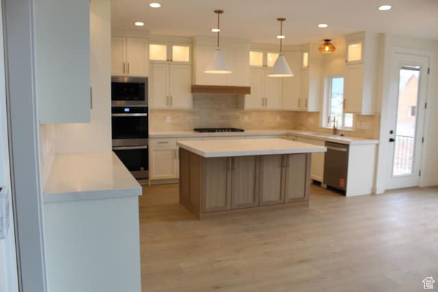 1318 S 1090 E, Salem, UT 84653 - kitchen with appliances with stainless steel finishes, decorative backsplash, white cabinetry, light wood finished floors, and recessed lighting