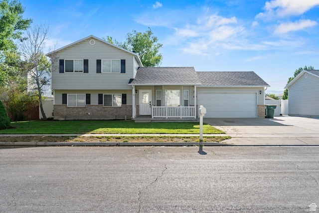 616 S 1430 W, Lehi, UT 84043 - view of front of house with brick siding, an attached garage, driveway, a shingled roof, and covered porch