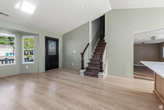 616 S 1430 W, Lehi, UT 84043 - entryway with vaulted ceiling, light wood finished floors, and stairs