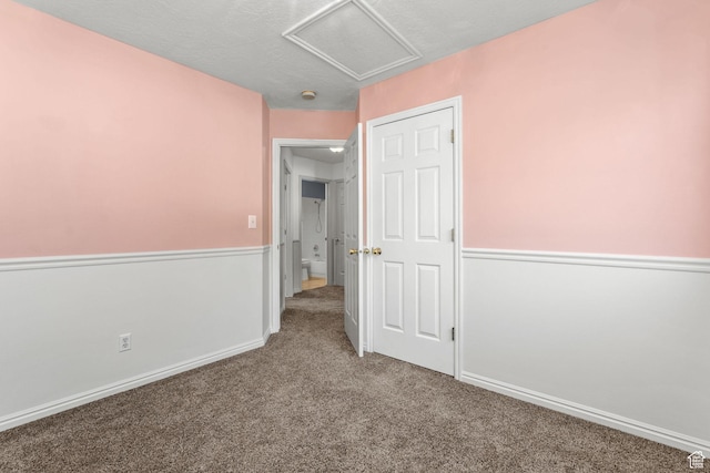 616 S 1430 W, Lehi, UT 84043 - unfurnished bedroom with attic access, carpet floors, and wainscoting
