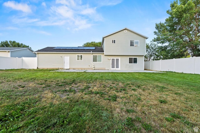 616 S 1430 W, Lehi, UT 84043 - back of house featuring a patio area, solar panels, and a fenced backyard