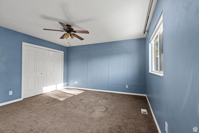 616 S 1430 W, Lehi, UT 84043 - unfurnished bedroom with carpet flooring, a decorative wall, a ceiling fan, and a closet