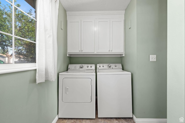 616 S 1430 W, Lehi, UT 84043 - laundry room featuring independent washer and dryer, healthy amount of natural light, and cabinet space