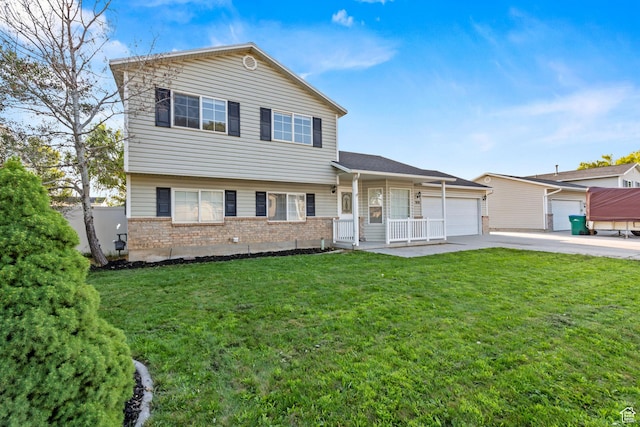 616 S 1430 W, Lehi, UT 84043 - view of front of house featuring brick siding, concrete driveway, an attached garage, a porch, and a front yard