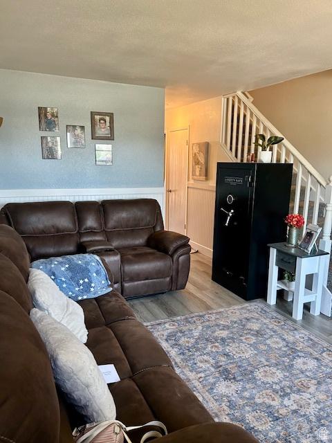 1200 N 100 W Unit 40, Vernal, UT 84078 - living room with stairway and wood finished floors