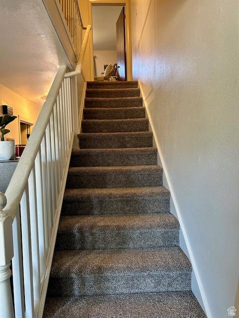 1200 N 100 W Unit 40, Vernal, UT 84078 - stairway featuring carpet flooring