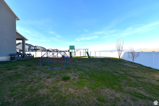 4666 W Olympic Wood Ct, West Jordan, UT 84084 - fenced backyard with a playground