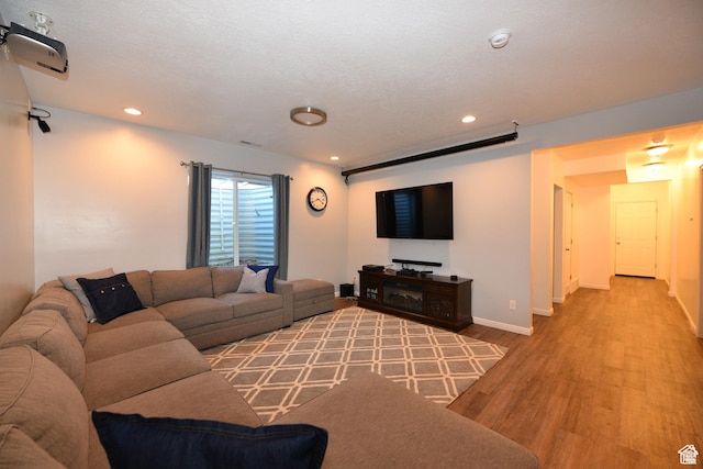 4666 W Olympic Wood Ct, West Jordan, UT 84084 - living area featuring wood finished floors and recessed lighting