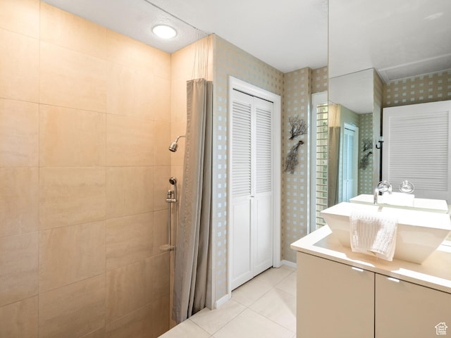4506 S Gilead Way E, Millcreek, UT 84124 - bathroom featuring wallpapered walls, vanity, tile patterned floors, tiled shower, and a closet