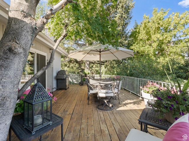 4506 S Gilead Way E, Millcreek, UT 84124 - wooden deck featuring a grill and outdoor dining space