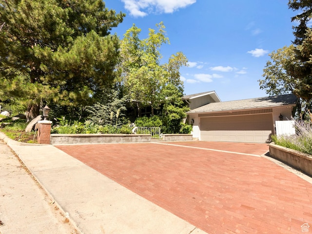 4506 S Gilead Way E, Millcreek, UT 84124 - view of front of property featuring an attached garage