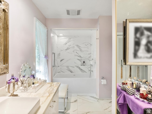 4506 S Gilead Way E, Millcreek, UT 84124 - bathroom with marble look tiles, vanity, and  shower combination