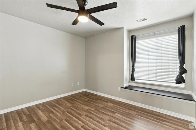 729 N Buckingham Dr W, North Salt Lake, UT 84054 - unfurnished room with wood finished floors, ceiling fan, and a textured ceiling