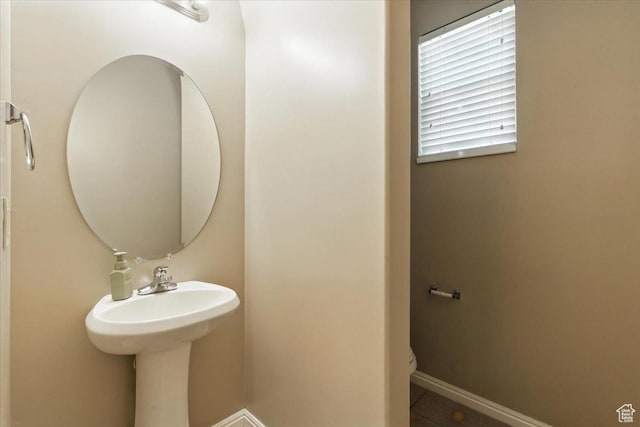 729 N Buckingham Dr W, North Salt Lake, UT 84054 - half bathroom with toilet and baseboards