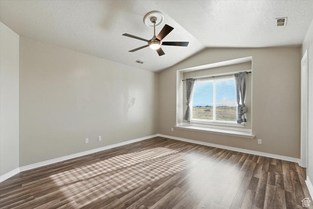 729 N Buckingham Dr W, North Salt Lake, UT 84054 - unfurnished room with wood finished floors, a ceiling fan, lofted ceiling, and a textured ceiling