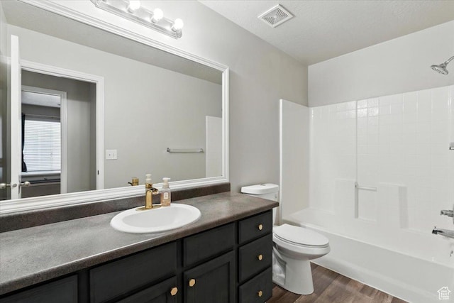 729 N Buckingham Dr W, North Salt Lake, UT 84054 - full bathroom with wood finished floors, vanity, and shower / bath combination
