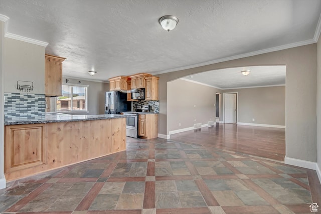 9517 N Shiloh Way E, Eagle Mountain, UT 84005 - kitchen with stainless steel electric stove, black microwave, arched walkways, open floor plan, and backsplash