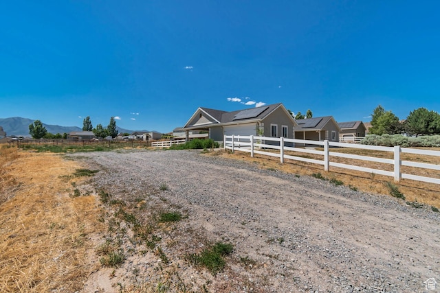 9517 N Shiloh Way E, Eagle Mountain, UT 84005 - fenced front yard with a mountain view