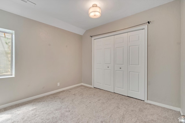 9517 N Shiloh Way E, Eagle Mountain, UT 84005 - unfurnished bedroom with carpet, vaulted ceiling, and a closet