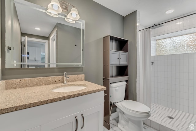 9517 N Shiloh Way E, Eagle Mountain, UT 84005 - bathroom with vanity, tiled shower, marble look tiles, and recessed lighting