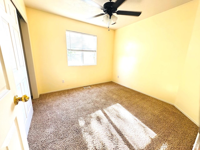 2592 W 2650 N, Clinton, UT 84015 - unfurnished bedroom with carpet floors, a closet, and a ceiling fan