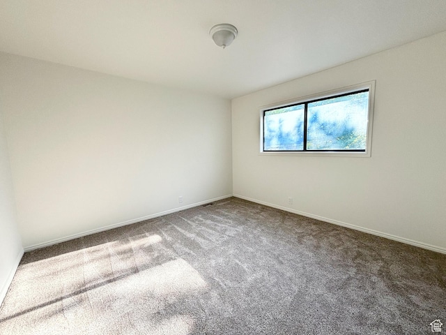 7692 S Chad St, Midvale, UT 84047 - spare room featuring carpet flooring and baseboards