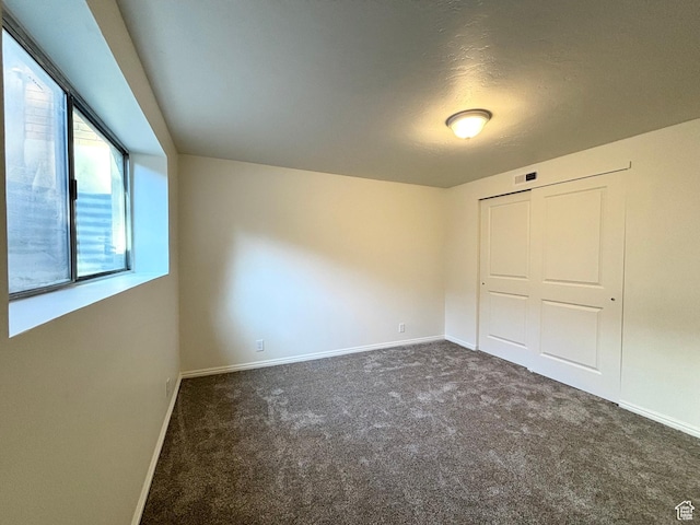 7692 S Chad St, Midvale, UT 84047 - unfurnished bedroom with carpet floors and a closet