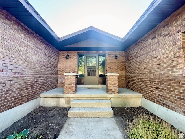 7692 S Chad St, Midvale, UT 84047 - view of exterior entry featuring brick siding