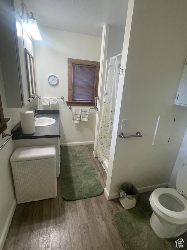 5518 E 500 N, Fort Duchesne, UT 84026 - bathroom with wood finished floors, vanity, and curtained shower