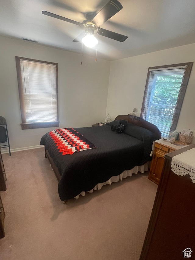 5518 E 500 N, Fort Duchesne, UT 84026 - bedroom featuring light carpet and a ceiling fan