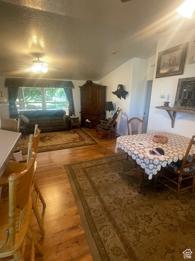 5518 E 500 N, Fort Duchesne, UT 84026 - dining area featuring a ceiling fan, wood finished floors, and a textured ceiling