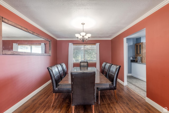 8268 S 865 E, Sandy, UT 84094 - dining area with a chandelier, wood finished floors, plenty of natural light, a textured ceiling, and ornamental molding