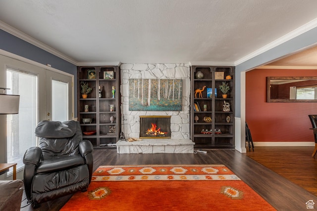 8268 S 865 E, Sandy, UT 84094 - living room featuring wood finished floors, a fireplace, and crown molding