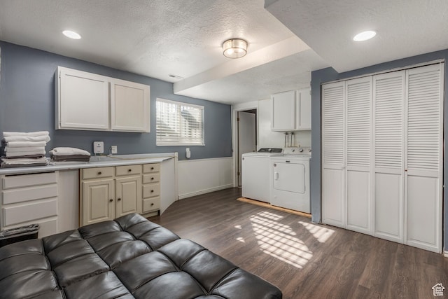 8268 S 865 E, Sandy, UT 84094 - kitchen with washing machine and dryer, a textured ceiling, dark wood-style flooring, light countertops, and white cabinetry