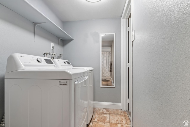 639 E Swenson Ave Unit 4, Springville, UT 84663 - washroom featuring independent washer and dryer and light stone finish floors