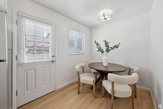 140 W 1200 N, Orem, UT 84057 - dining room with light wood-style floors and baseboards