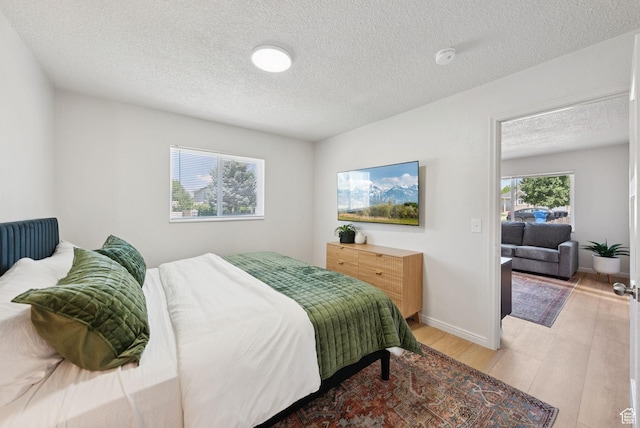 140 W 1200 N, Orem, UT 84057 - bedroom with a textured ceiling and light wood finished floors