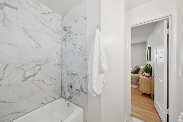 140 W 1200 N, Orem, UT 84057 - bathroom featuring shower / bath combination, ensuite bath, and wood finished floors