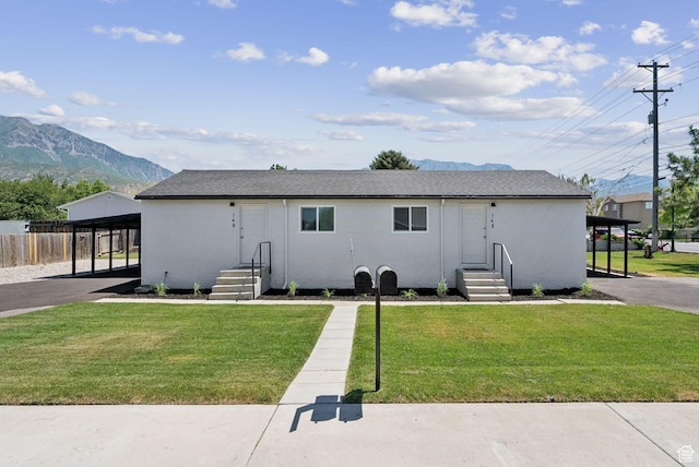 140 W 1200 N, Orem, UT 84057 - view of front of property featuring a mountain view, a carport, and stucco siding