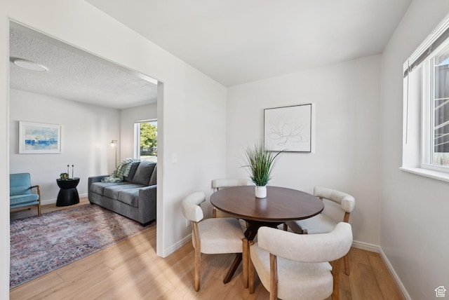 140 W 1200 N, Orem, UT 84057 - dining space with light wood-style flooring and baseboards