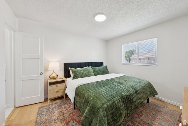 140 W 1200 N, Orem, UT 84057 - bedroom with wood finished floors and a textured ceiling
