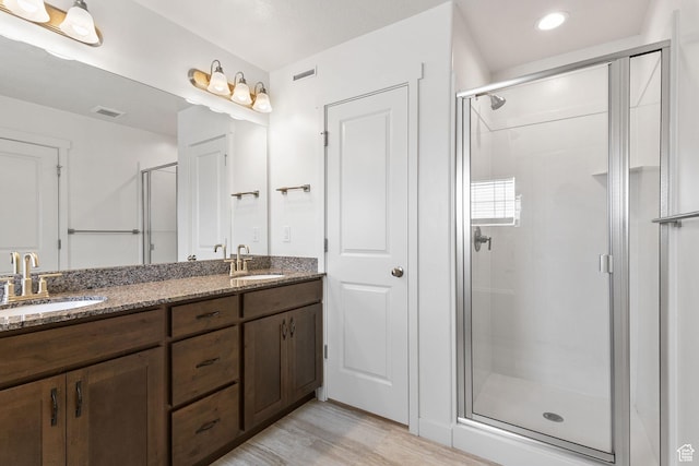 1152 S 800 W, Spanish Fork, UT 84660 - full bath with a stall shower, double vanity, wood finished floors, and recessed lighting