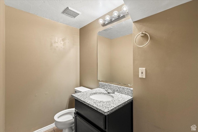 6410 W Martin Way S, West Valley City, UT 84128 - bathroom featuring toilet and vanity